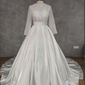 Wedding dress high neck long sleeves and long train with waist band and beading